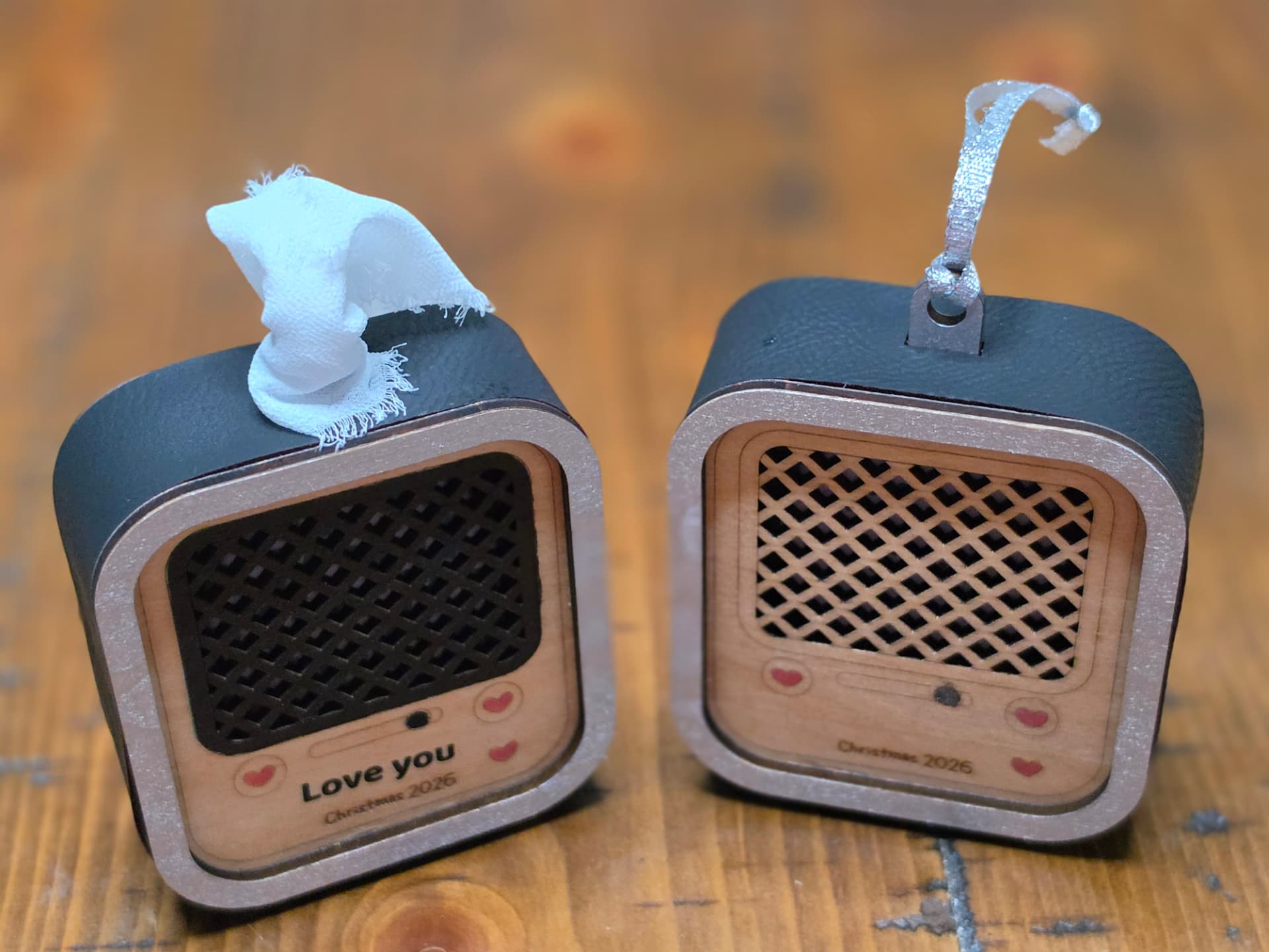 Two retro radio voice ornaments engraved with a personal message and the year
